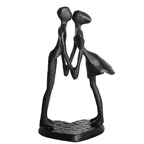 Loving couple iron sculpture