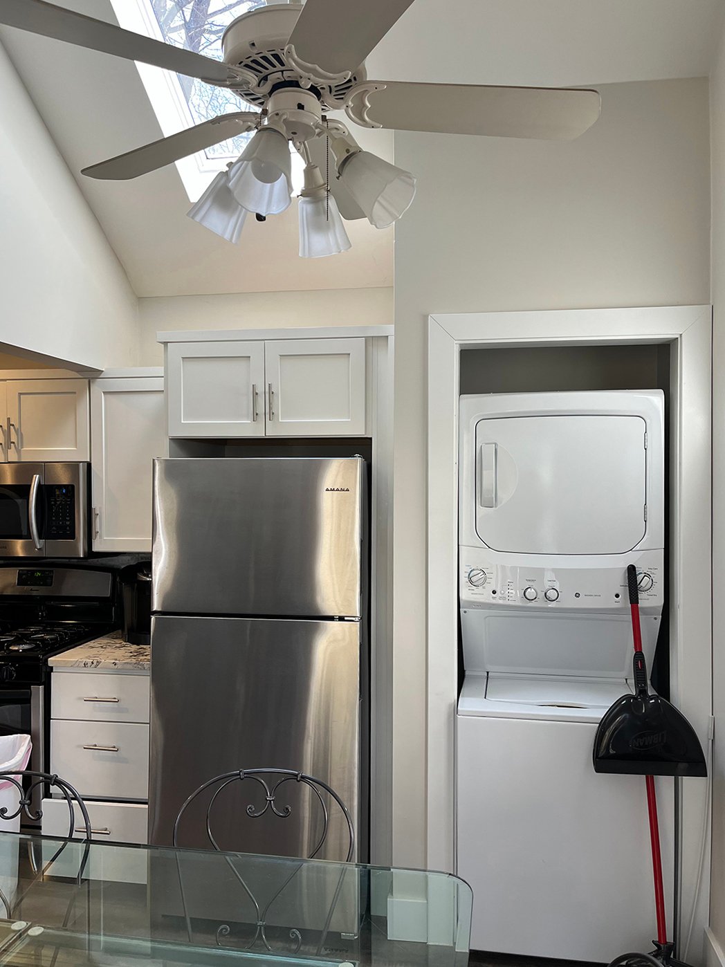 washer-dryer next to the kitchen