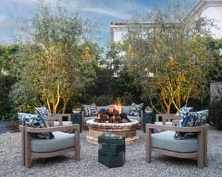 Fire pit with curved seating in outdoor living room
