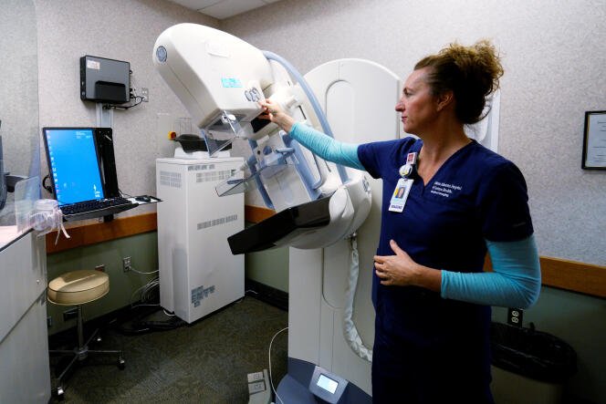 Karen Liley, mammography unit manager, shows off a GE 3D mammography machine at Littleton Adventist Hospital in Littleton, Colo., May 3, 2016.