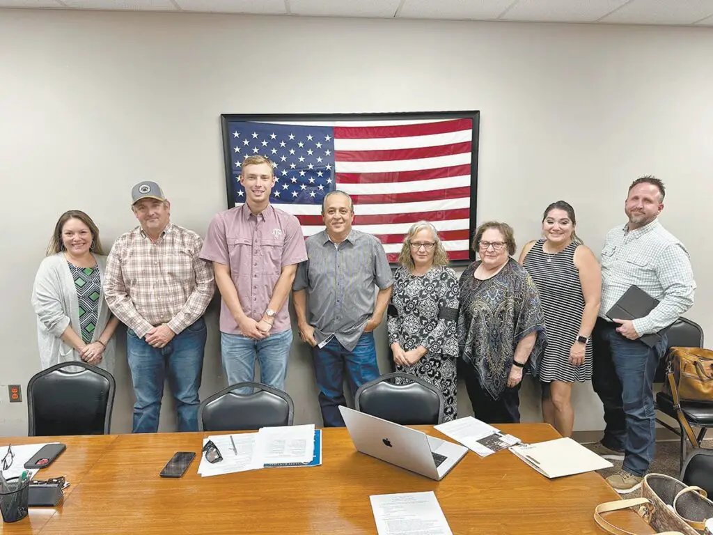 Floresville Event Center Manager Celina Guerrero, Floresville 4A Corp. Secretary Brian Gray, President Jake Lamberth, board members Billy Herrera Sr., Cecelia Rodriguez and Gloria Martinez, and Assistant City Manager Monica Veliz and board attorney Tom Caldwell gather for a photo in August. 15, the first meeting of the new Floresville 4A Corp. board since its appointment in June by the Floresville City Council. RACHEL DRAPER/Wilson County News